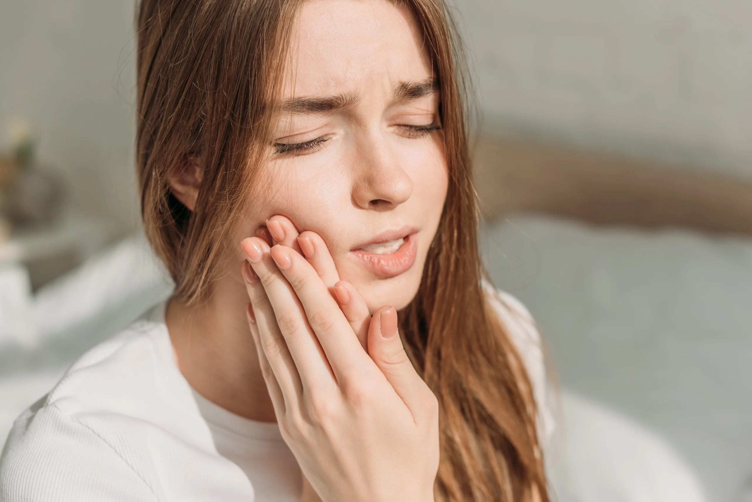 Patient experiencing tooth pain that may need a filling